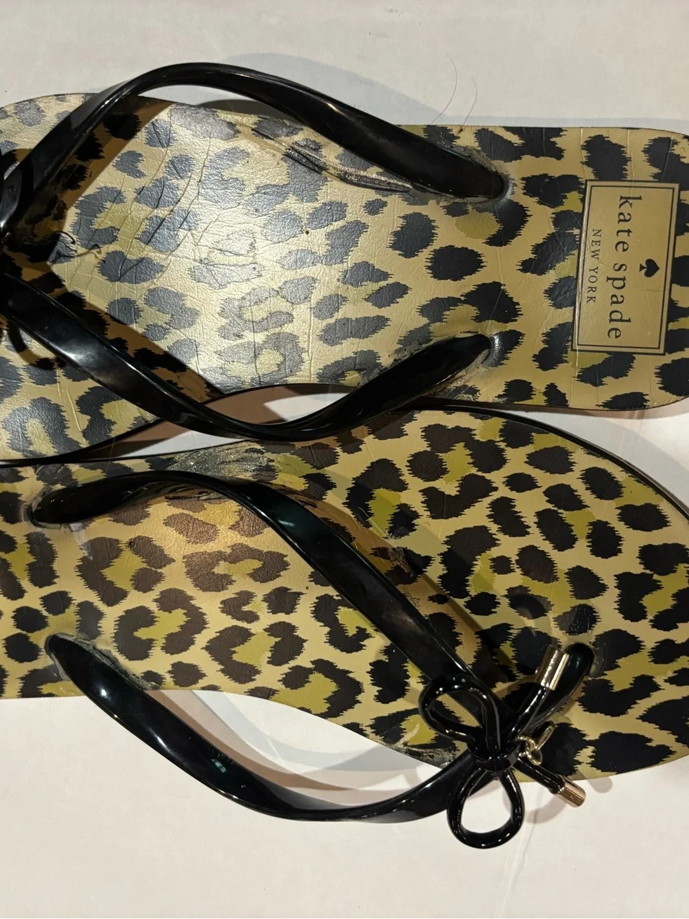 kate spade Leopard Print Jelly Flip Sandals in Black and Olive